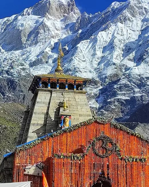 The Kedarnath temple below the Garhwal Himalaya