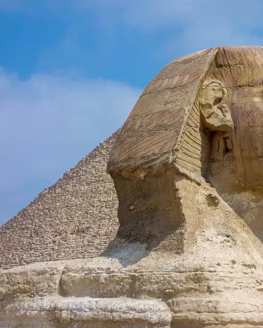 The Sphinx before the pyramids at Giza