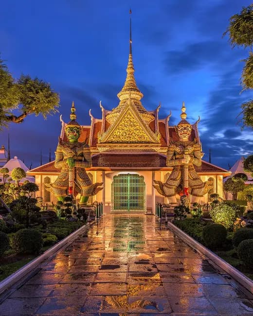 Wat Arun lit at dusk in Bangkok